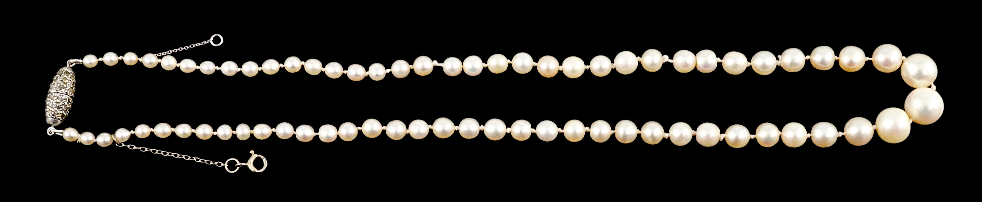 A single strand graduated natural saltwater pearl necklace, with AnchorCert report dated 31st March, 2023, with diamond set torpedo shaped clasp